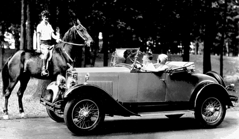 May Hopper and Garth Castle, out for a spin in Mays new Erskine sport roadster,                                   encounter an unidentified equestrienne, somewhere on Long Island, about 1928.